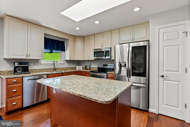3195 Atlee Ridge Rd, New Windsor, MD 21776 - kitchen featuring appliances with stainless steel finishes, a sink, a skylight, dark wood-type flooring, and recessed lighting