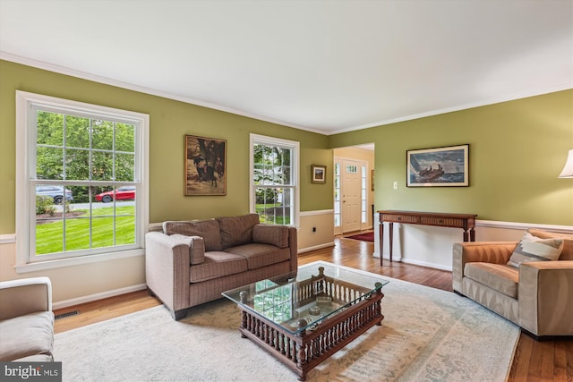 10127 Hillington Ct, Vienna, VA 22182 - living area with crown molding, wood finished floors, and baseboards