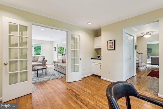 10127 Hillington Ct, Vienna, VA 22182 - living area with light wood-style flooring, stairway, ornamental molding, baseboards, and recessed lighting