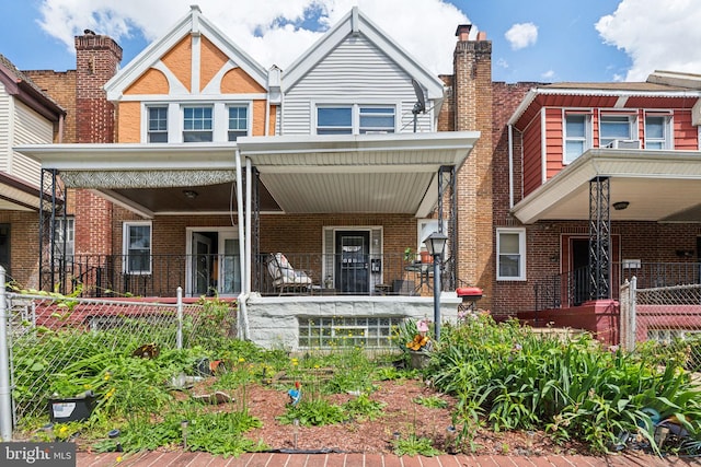 5615 N Warnock St, Philadelphia, PA 19141 - view of front of house featuring a porch and brick siding