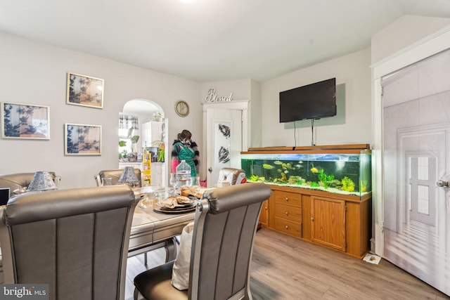 5615 N Warnock St, Philadelphia, PA 19141 - living area featuring light wood-style flooring and arched walkways