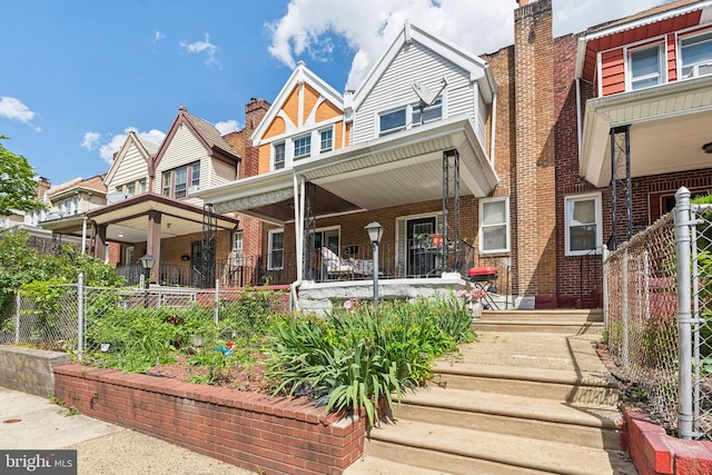 5615 N Warnock St, Philadelphia, PA 19141 - back of property with a porch and brick siding