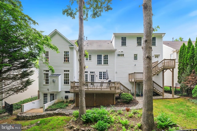 850 Still Creek Ln, Gaithersburg, MD 20878 - rear view of property featuring stairway, a deck, and a shingled roof