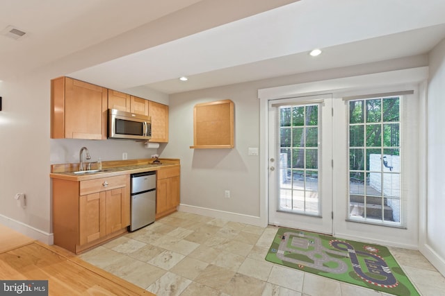 850 Still Creek Ln, Gaithersburg, MD 20878 - kitchen with a sink, appliances with stainless steel finishes, baseboards, light countertops, and recessed lighting