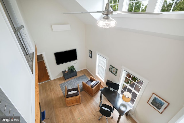 850 Still Creek Ln, Gaithersburg, MD 20878 - living area featuring high vaulted ceiling, a ceiling fan, wood finished floors, and a desk