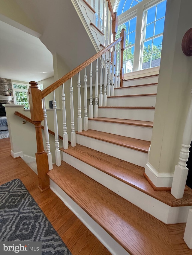 850 Still Creek Ln, Gaithersburg, MD 20878 - stairs with wood finished floors and baseboards