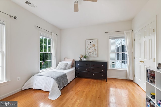 850 Still Creek Ln, Gaithersburg, MD 20878 - bedroom with light wood finished floors, baseboards, and ceiling fan