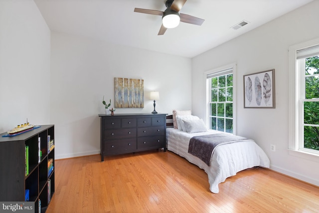 850 Still Creek Ln, Gaithersburg, MD 20878 - bedroom with multiple windows, light wood-type flooring, baseboards, and a ceiling fan