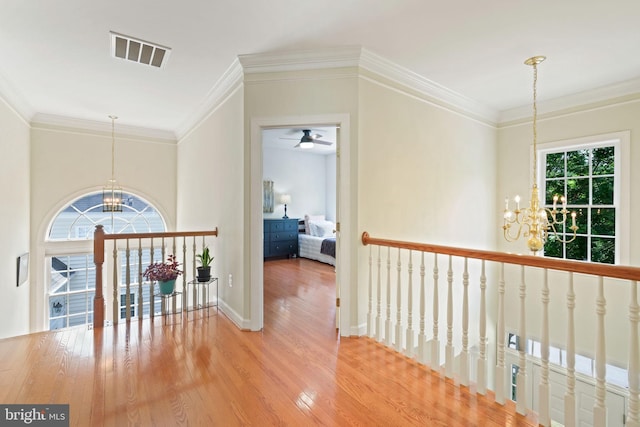 850 Still Creek Ln, Gaithersburg, MD 20878 - corridor with a chandelier, wood finished floors, ornamental molding, an upstairs landing, and baseboards