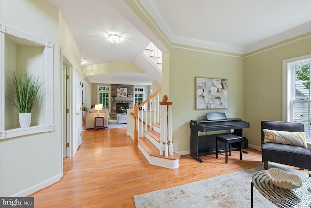 850 Still Creek Ln, Gaithersburg, MD 20878 - sitting room with stairs, light wood-style flooring, ornamental molding, and baseboards