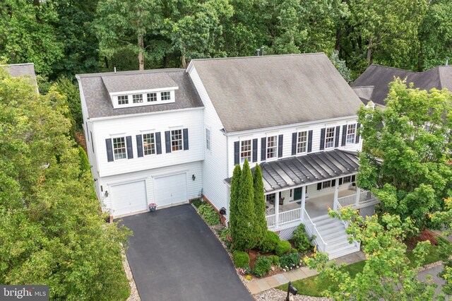 850 Still Creek Ln, Gaithersburg, MD 20878 - view of front of property featuring covered porch, stairway, a garage, asphalt driveway, and a shingled roof