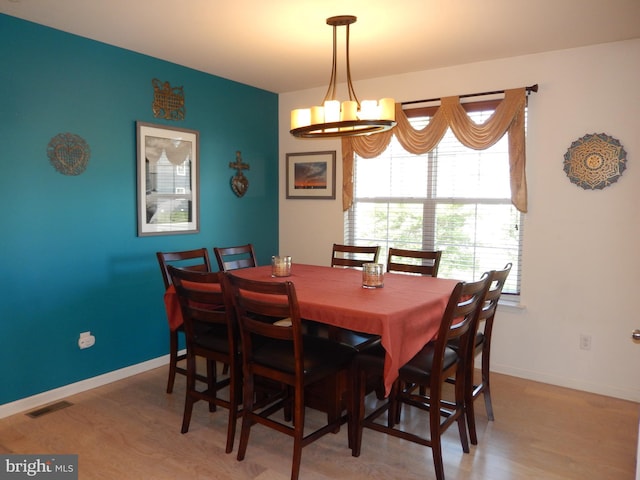 20172 Trap Pond Ct, Millville, DE 19967 - dining room with light wood-style floors and baseboards