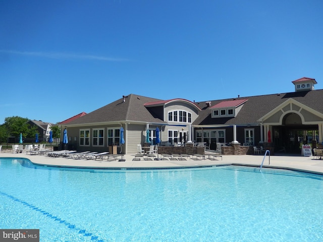 20172 Trap Pond Ct, Millville, DE 19967 - community pool featuring a patio area