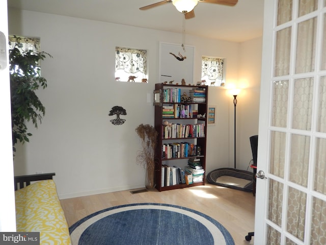 20172 Trap Pond Ct, Millville, DE 19967 - sitting room with wood finished floors and ceiling fan