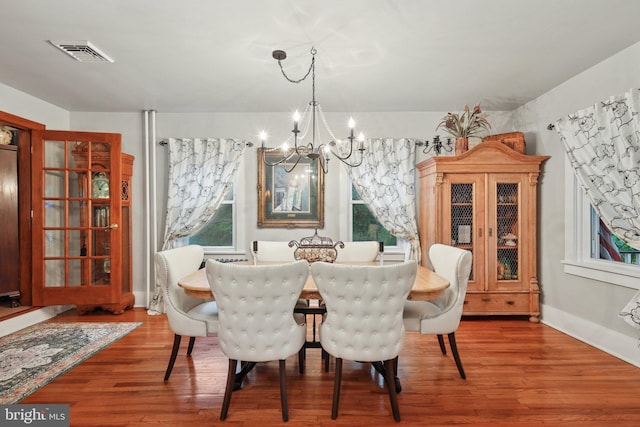 2 Broad St, Stockton, NJ 08559 - dining room featuring a chandelier and wood finished floors