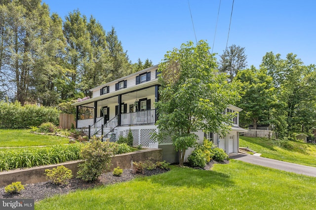 2 Broad St, Stockton, NJ 08559 - view of front of house featuring a porch, asphalt driveway, an attached garage, and stairway