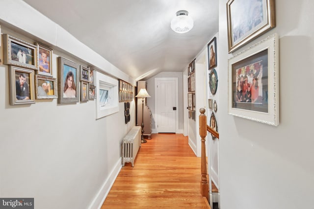 2 Broad St, Stockton, NJ 08559 - hall featuring radiator heating unit, vaulted ceiling, light wood-style floors, and baseboards