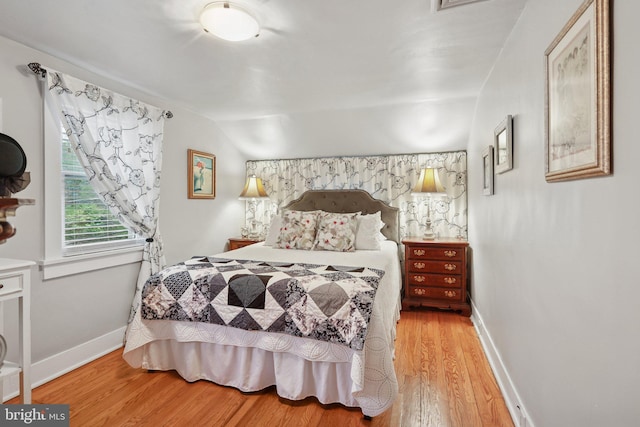 2 Broad St, Stockton, NJ 08559 - bedroom with light wood-style flooring, baseboards, and vaulted ceiling