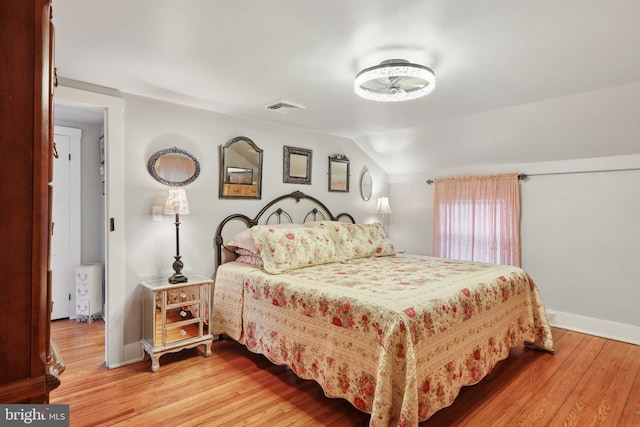 2 Broad St, Stockton, NJ 08559 - bedroom with light wood-style floors, baseboards, and vaulted ceiling