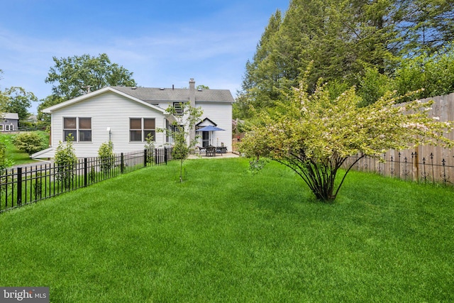 2 Broad St, Stockton, NJ 08559 - rear view of property with a patio area and a chimney