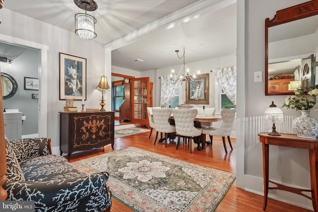 2 Broad St, Stockton, NJ 08559 - dining area featuring a chandelier and wood finished floors