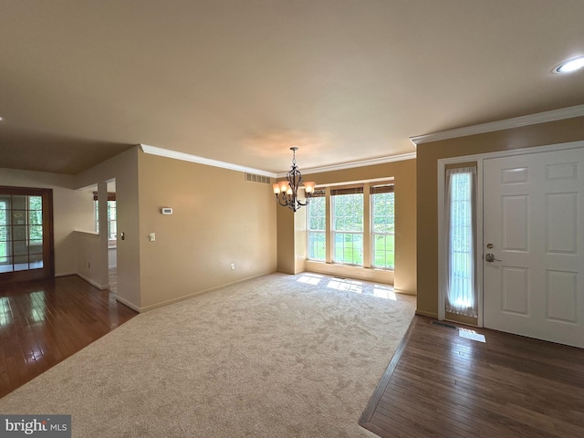 448 Country Club Dr, Lansdale, PA 19446 - entrance foyer featuring a chandelier, baseboards, ornamental molding, plenty of natural light, and dark wood-style floors