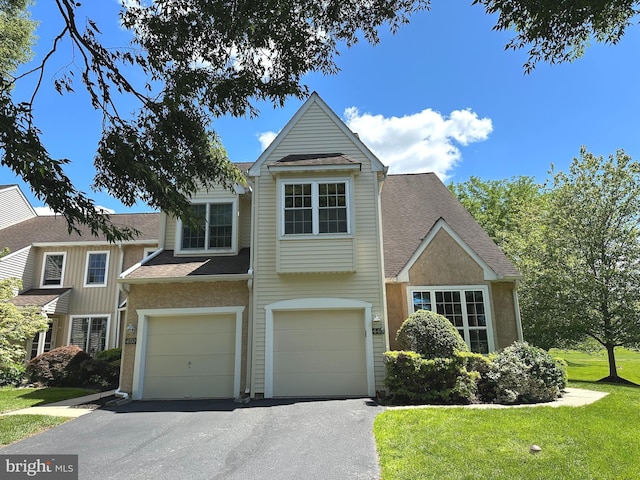 448 Country Club Dr, Lansdale, PA 19446 - view of front of home featuring asphalt driveway, a garage, roof with shingles, and a front lawn