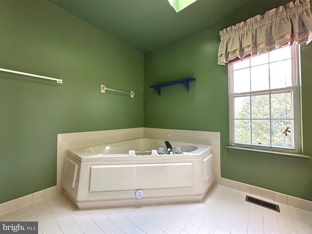 448 Country Club Dr, Lansdale, PA 19446 - full bath with a garden tub, baseboards, healthy amount of natural light, and tile patterned flooring