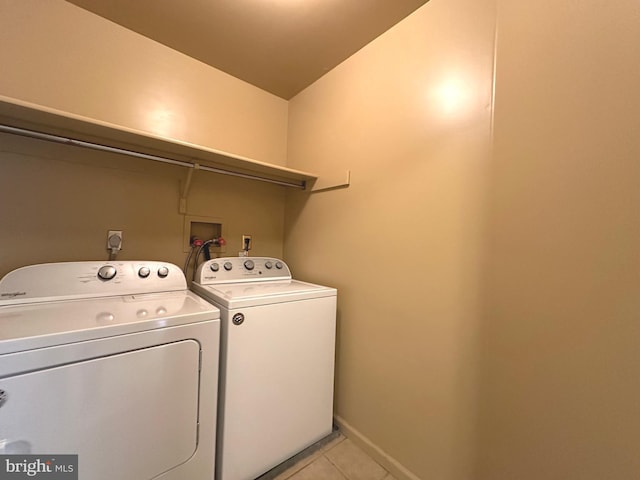 448 Country Club Dr, Lansdale, PA 19446 - washroom featuring light tile patterned floors, washer and clothes dryer, and baseboards