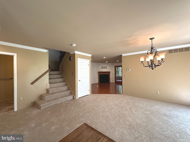 448 Country Club Dr, Lansdale, PA 19446 - stairs featuring carpet, baseboards, ornamental molding, a chandelier, and a fireplace