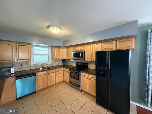 1236 Whittier Ave, Bensalem, PA 19020 - kitchen featuring stainless steel appliances, light brown cabinetry, a sink, and decorative backsplash