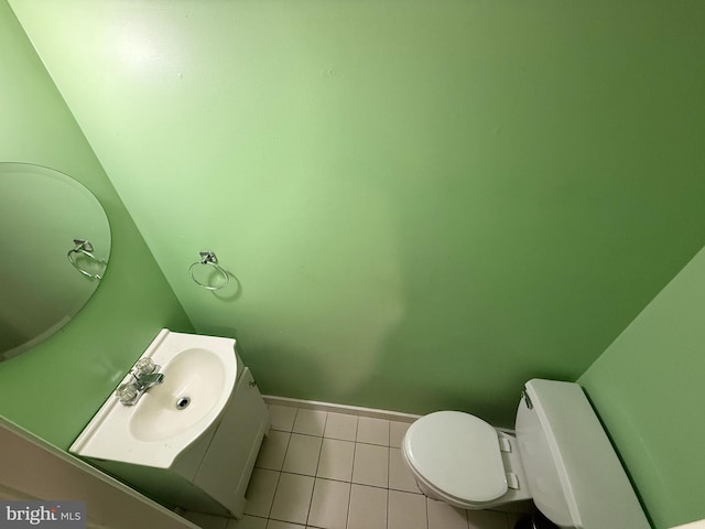 1236 Whittier Ave, Bensalem, PA 19020 - half bathroom with toilet, vanity, tile patterned flooring, and baseboards