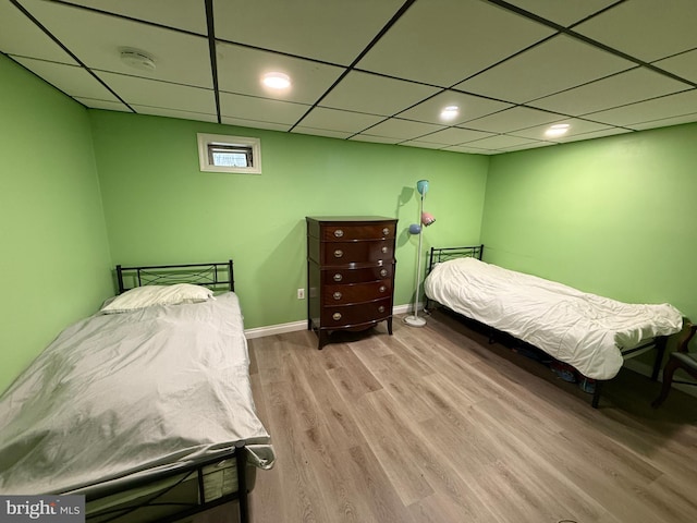 1236 Whittier Ave, Bensalem, PA 19020 - bedroom with wood finished floors, baseboards, and a paneled ceiling