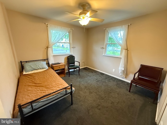 1236 Whittier Ave, Bensalem, PA 19020 - bedroom with dark carpet, baseboards, and a ceiling fan