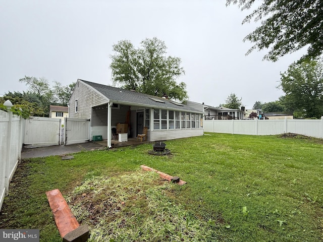 1236 Whittier Ave, Bensalem, PA 19020 - back of property with a sunroom and a gate