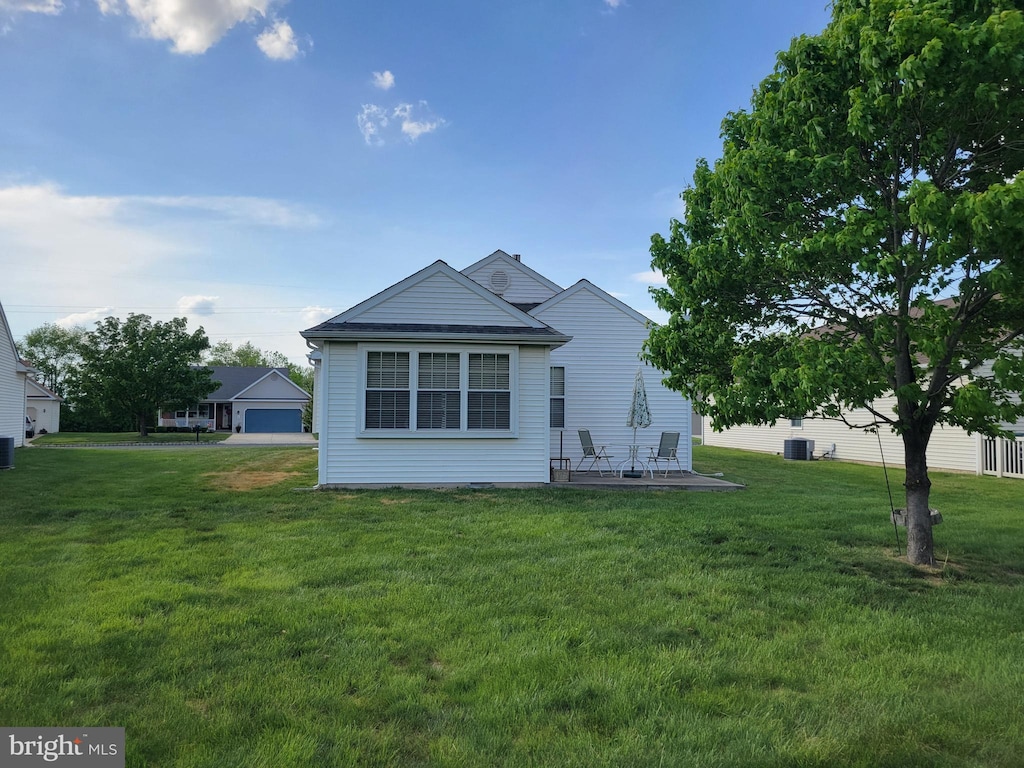 231 Gaunt Dr, Mickleton, NJ 08056 - back of house with a yard and central AC unit