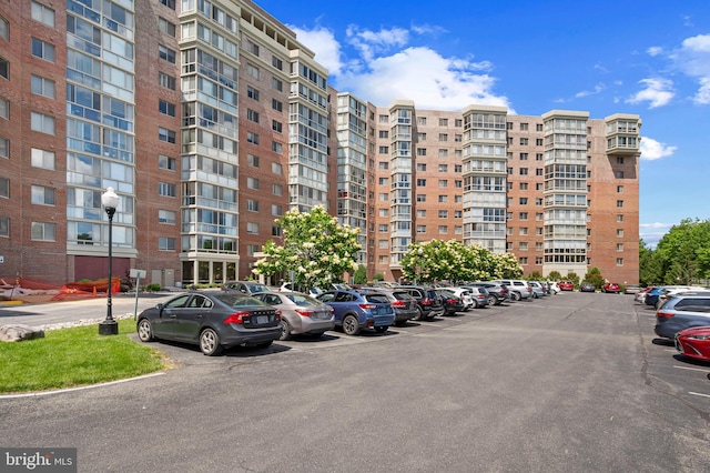 3100 N Leisure World Blvd Unit 716, Silver Spring, MD 20906 - view of apartment building / complex with uncovered parking