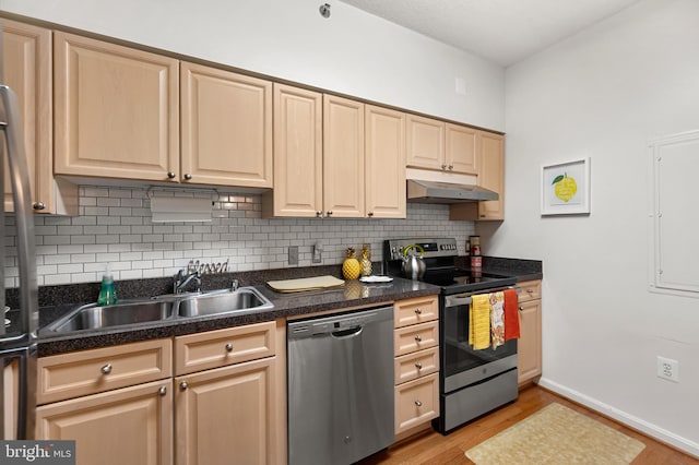3100 N Leisure World Blvd Unit 716, Silver Spring, MD 20906 - kitchen featuring appliances with stainless steel finishes, under cabinet range hood, a sink, light brown cabinets, and decorative backsplash