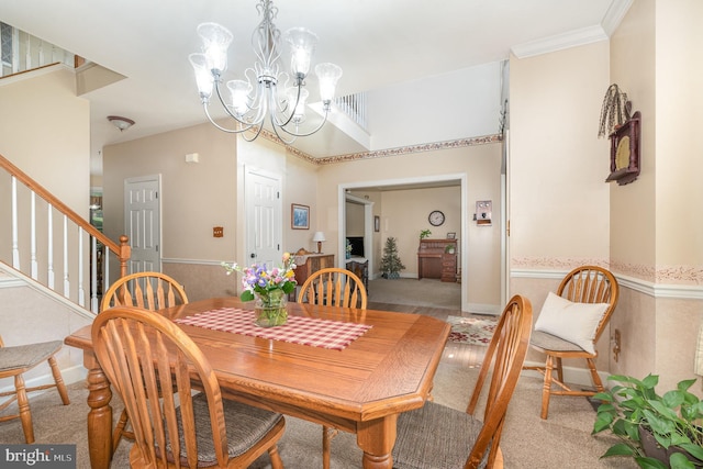 412 Hemlock Dr, New Cumberland, PA 17070 - dining area featuring a chandelier, stairs, light carpet, and ornamental molding