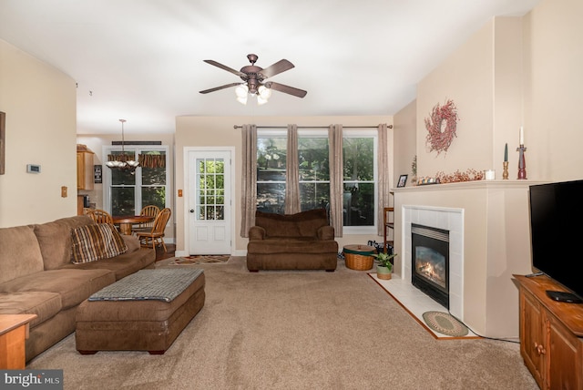 412 Hemlock Dr, New Cumberland, PA 17070 - carpeted living area with a ceiling fan, a fireplace, and a chandelier