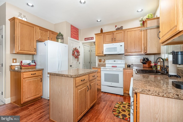 412 Hemlock Dr, New Cumberland, PA 17070 - kitchen with white appliances, a sink, wood finished floors, a center island, and recessed lighting