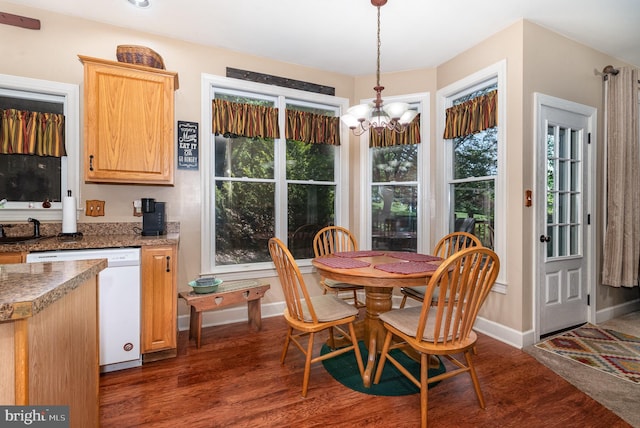 412 Hemlock Dr, New Cumberland, PA 17070 - dining area with a chandelier, dark wood-style floors, and baseboards