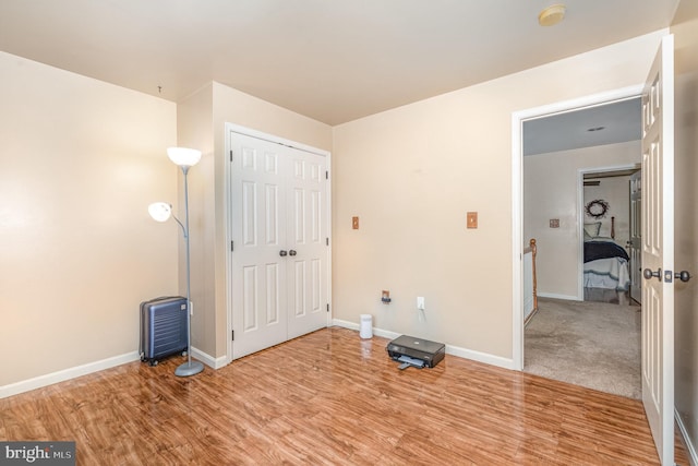 412 Hemlock Dr, New Cumberland, PA 17070 - unfurnished bedroom featuring wood finished floors, baseboards, and a closet