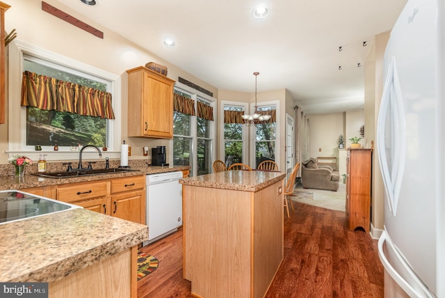 412 Hemlock Dr, New Cumberland, PA 17070 - kitchen featuring white appliances, a sink, a kitchen island, a chandelier, and dark wood-style flooring