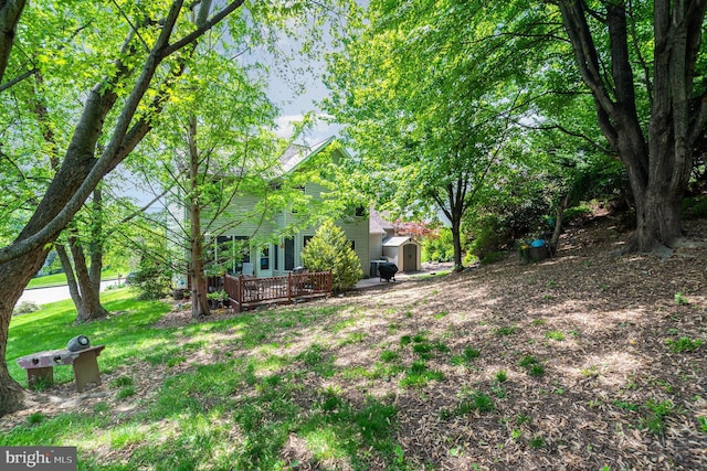 412 Hemlock Dr, New Cumberland, PA 17070 - view of yard featuring a deck