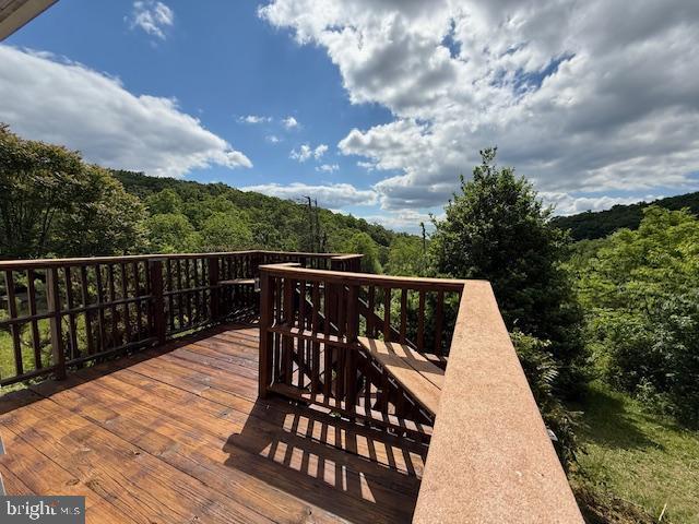 120 Omps Rd, Cross Junction, VA 22625 - wooden deck with a forest view
