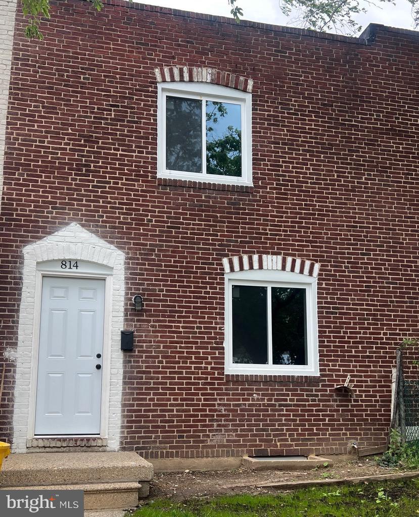 814 Jack St, Baltimore, MD 21225 - view of exterior entry with brick siding