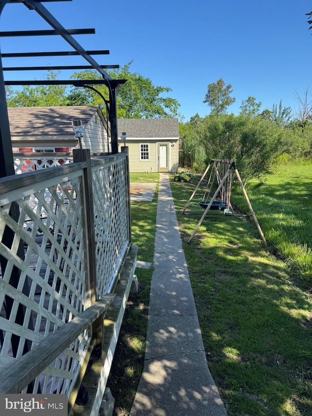 72 Maryland Ave, Crisfield, MD 21817 - view of green lawn with an outbuilding