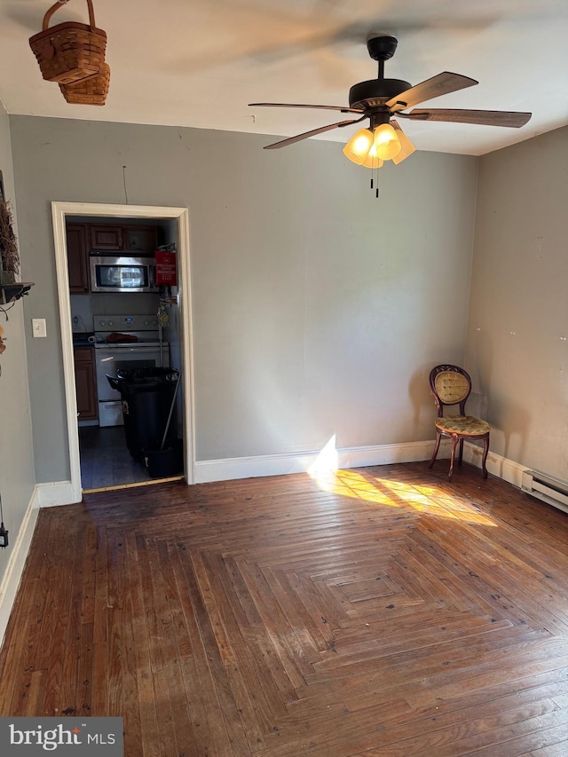 72 Maryland Ave, Crisfield, MD 21817 - unfurnished room featuring a ceiling fan and baseboards