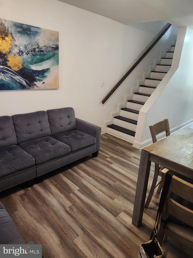 1337 Ward St, Baltimore, MD 21230 - living area with wood finished floors and stairs